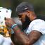keena allen putting helmet on