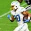 austin ekeler runinng away jersey