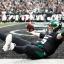 mike white sitting in end zone 