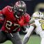 ronald jones and a saints defender