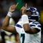 geno smith pointing up