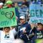 seahawks fans with Geno Smith signs