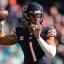 justin fields throwing blue jersey white sleeve
