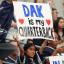 cowboys fan holding sign 