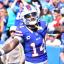 stefon diggs arms out blue jersey