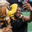 bijan robinson selfie with Falcon mascot