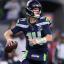 Sam Darnold throws a pass