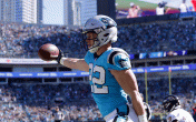 christian mccaffrey celebrating blue jersey