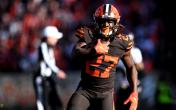 kareem hunt carrying ball brown