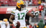 davante adams holding football