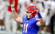 kyle trask celebrates