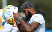 keena allen putting helmet on