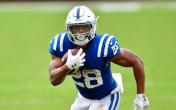 jonthan taylor running blue jersey