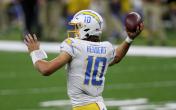 justin herbert back throwing away uniform