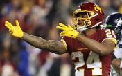 antinio gibson arms out to catch 