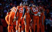 denver broncos offensive line huddle