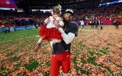 Harrison Butker with daughter after Super Bowl