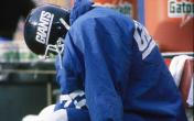 Sad Giants player on bench