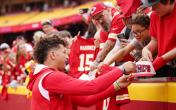Patrick Mahomes signing autographs