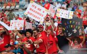 patrick mahomes fans in stands with signs 
