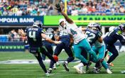 Chop Robinson attempting to block a punt