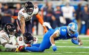 Bears defenders stopping Lions rusher