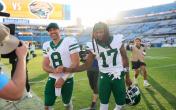 Aaron Rodgers and Davante Adams best friends walking and smiling 