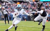 jahmyr gibbs evading tackler